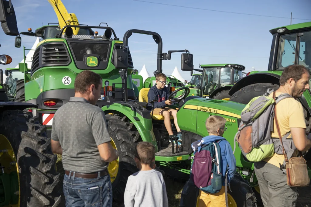 Child on a tractor at the Lessay fair