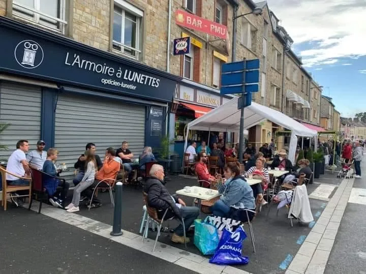 A drink on the terrace at the garage sale in La Haye du Puits dans la Manche in Normandy